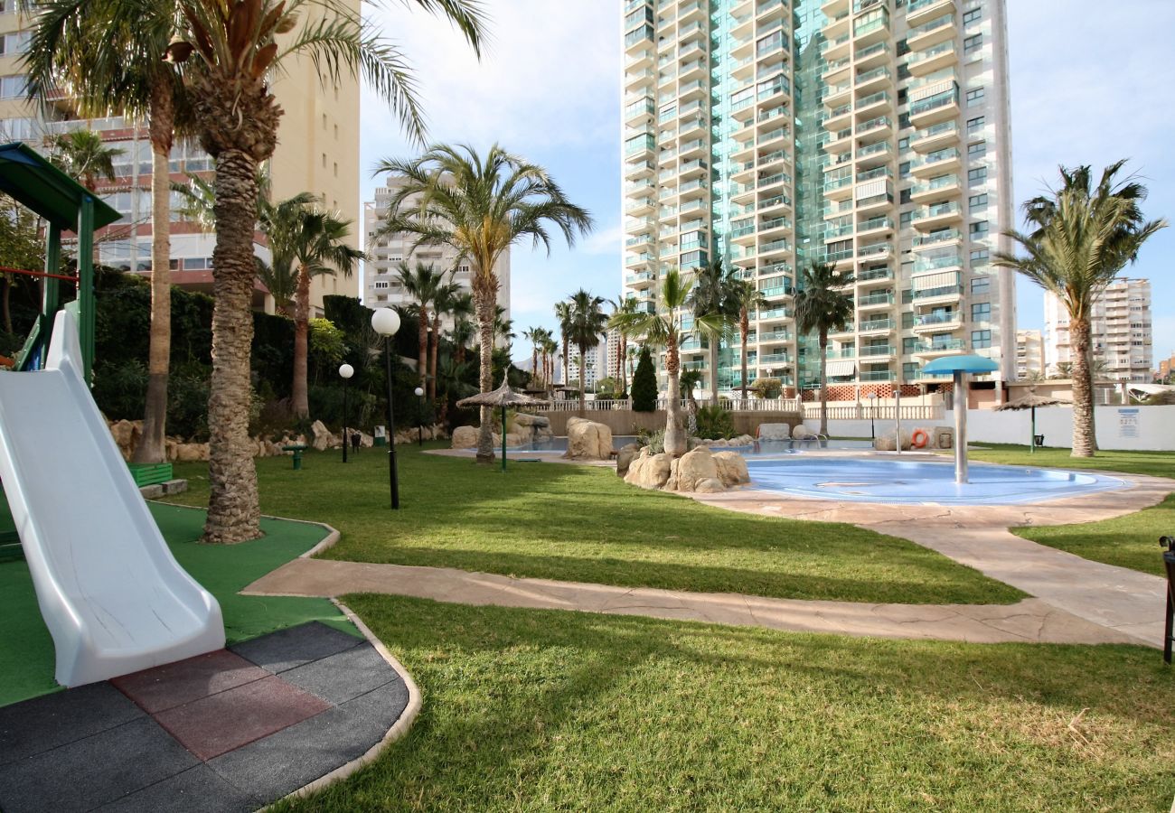 Spacious children's playground with lawn and slide in the holiday flat