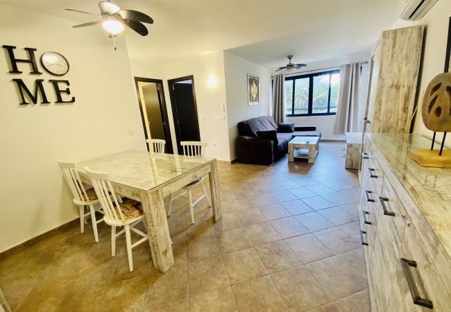 Modern and spacious living-dining room of the holiday flat 