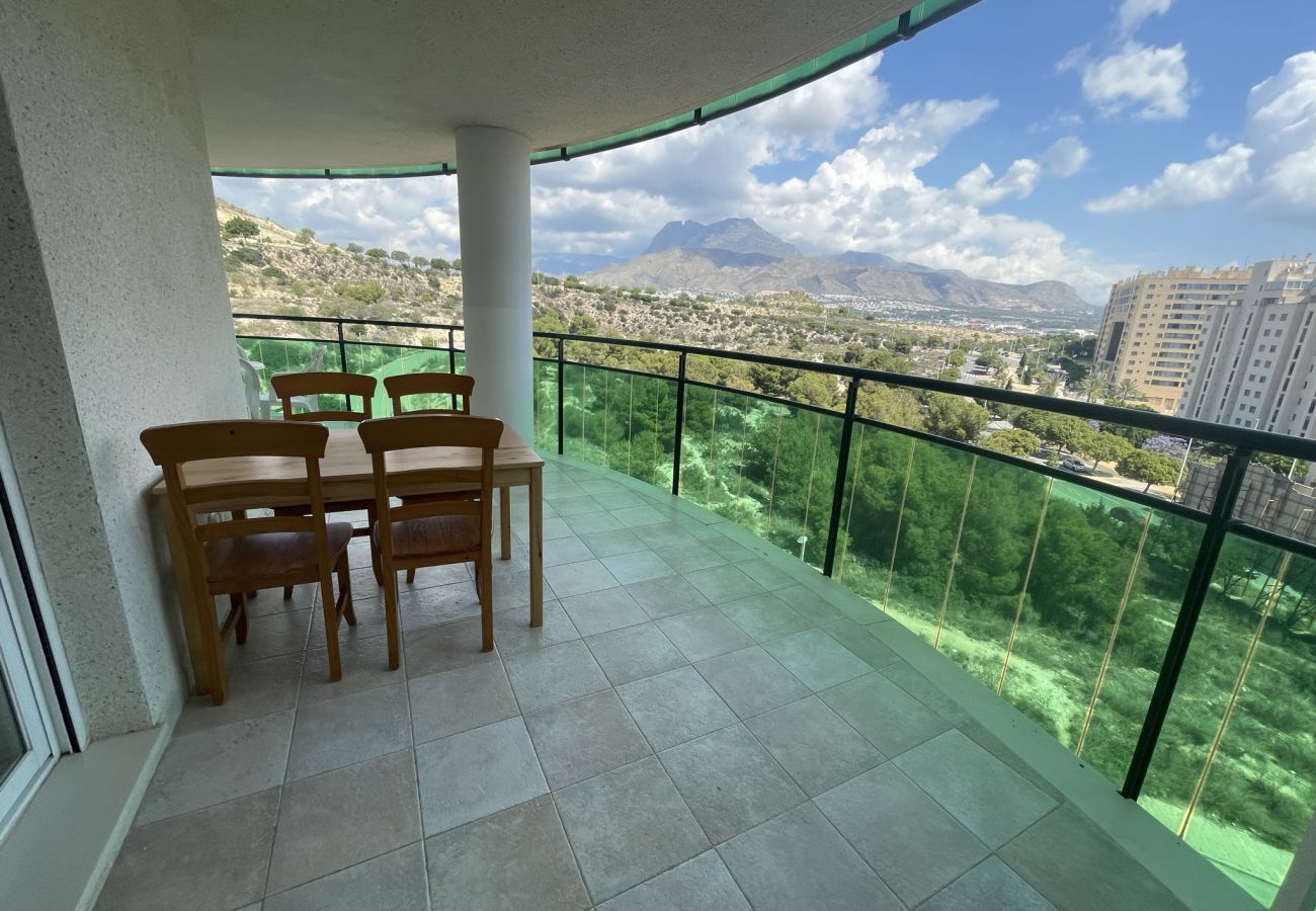 Large outdoor terrace with panoramic view of the Alicante mountains.