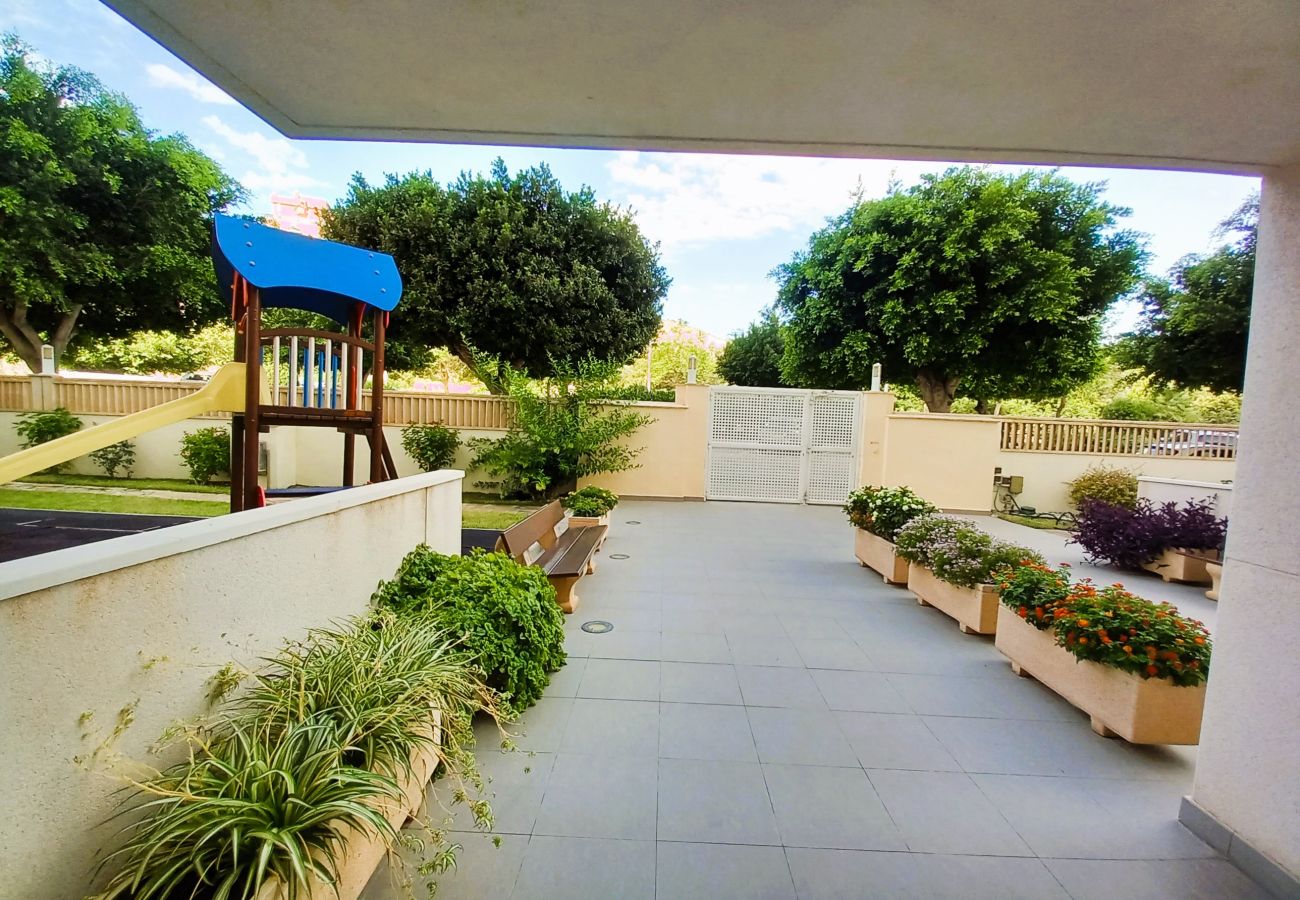 Common areas with children's playground of the holiday flat
